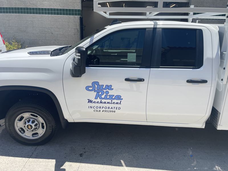 Sun Kiss Mechanical service truck with door lettering and contractor licence number