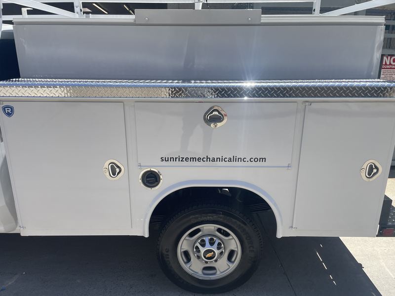 Sunrise Mechanical utility service body with company web address lettering