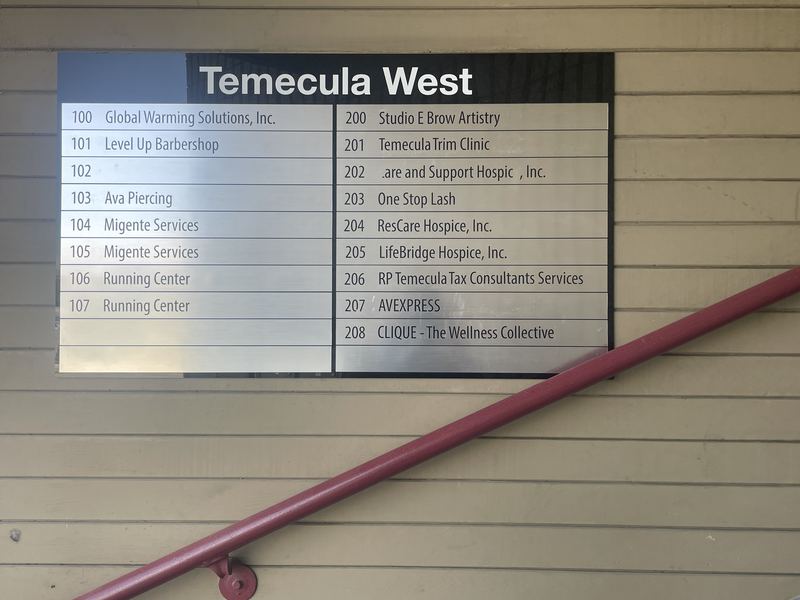 Two-column tenant directory listing suite numbers and business names at Temecula West